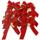 Six gold backed red velveteen bows