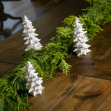 Set of 3 trees that are painted white with silver bough tips and covered in beautiful glitter paired with garland.