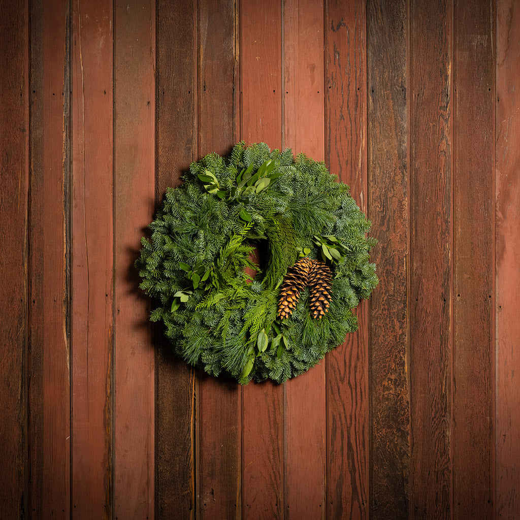 Christmas wreath with bay leaves, pine cones with no bow