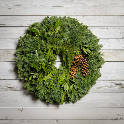 Christmas wreath with bay leaves, pine cones with no bow