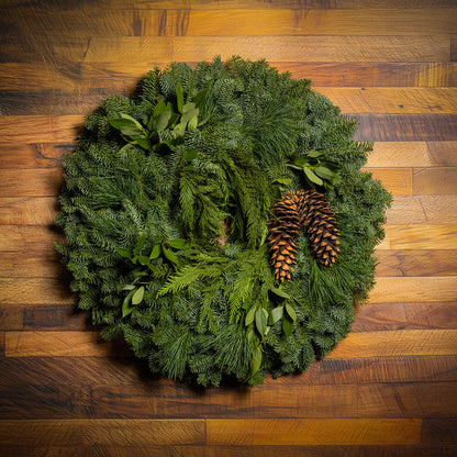 Christmas wreath with bay leaves, pine cones with no bow