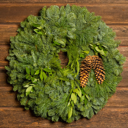 Christmas wreath with bay leaves, pine cones with no bow