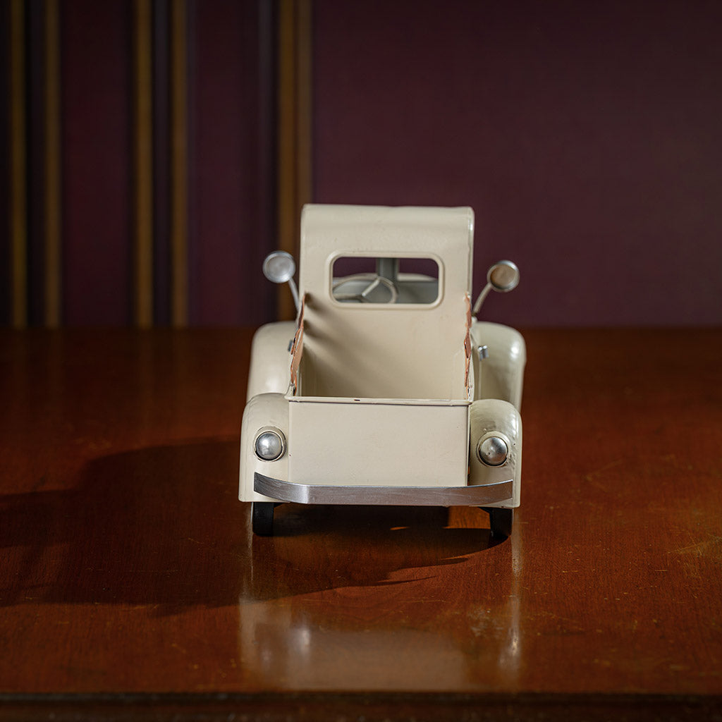 a cream metal truck container