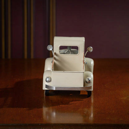 a cream metal truck container