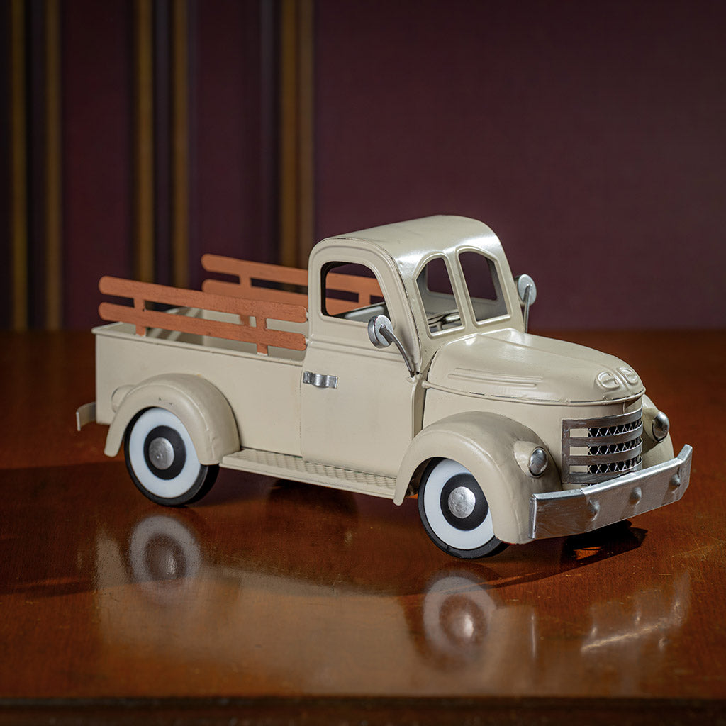 a cream metal truck container