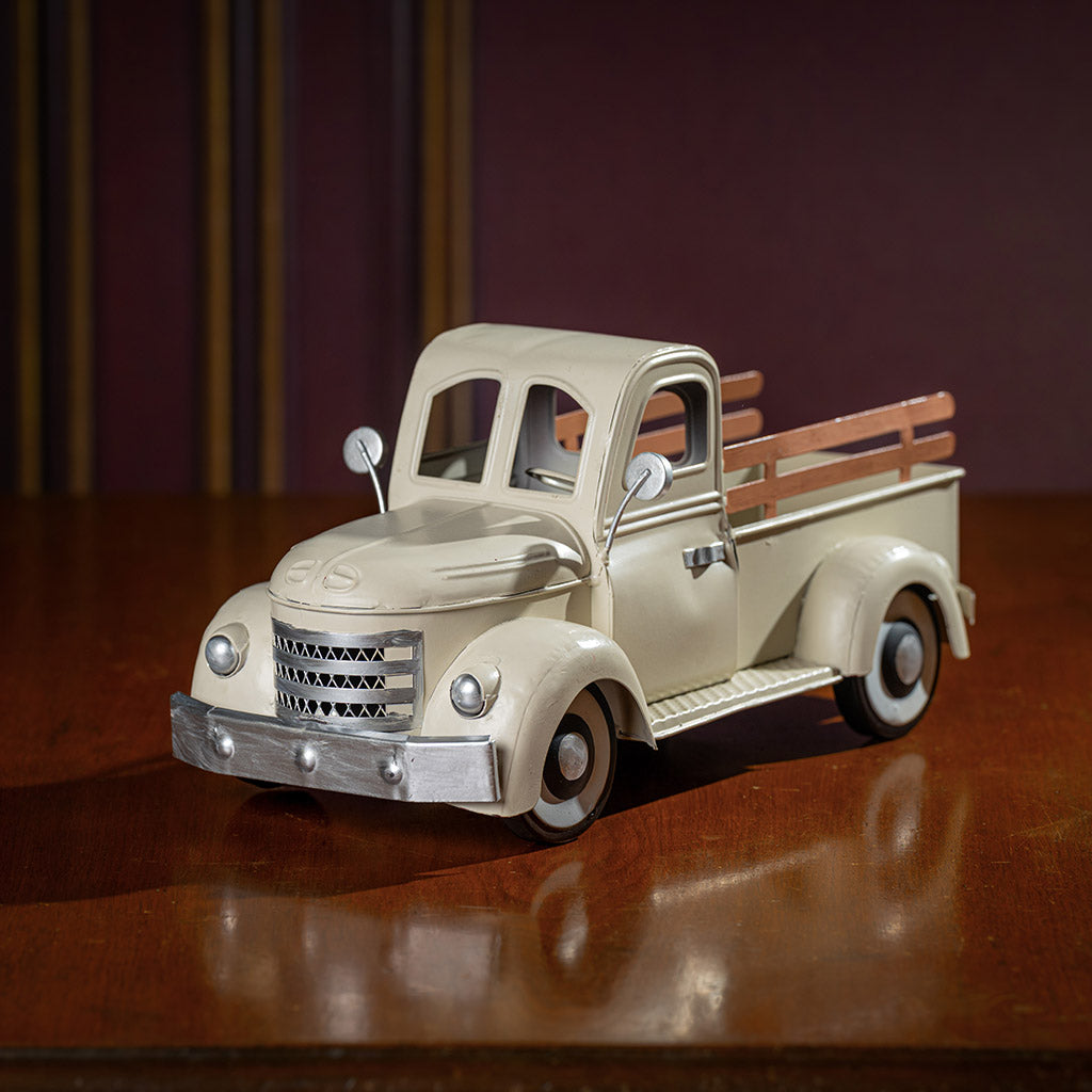 a cream metal truck container