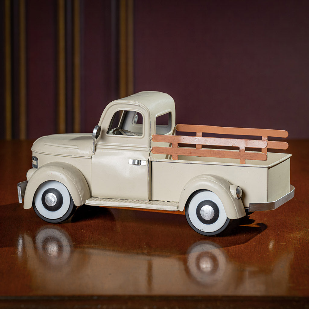 a cream metal truck container