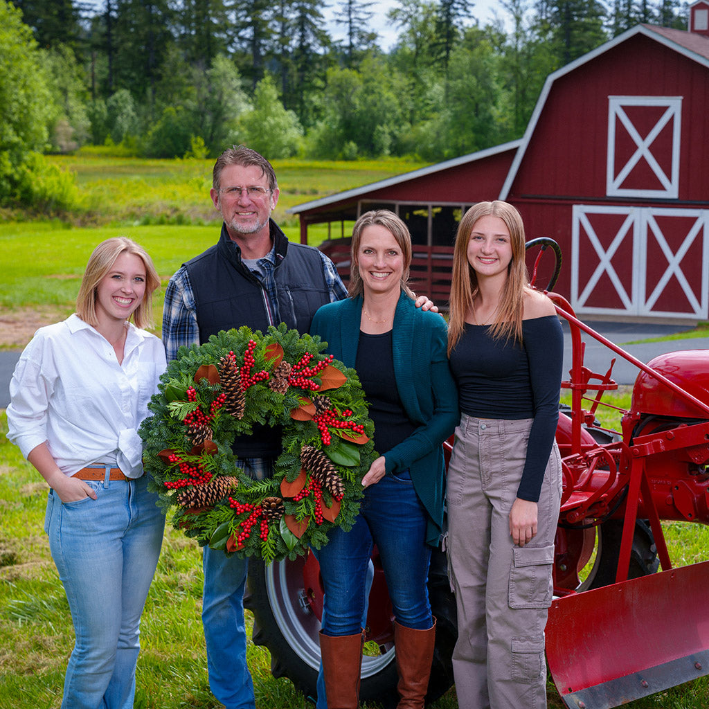 Red Berries and Magnolia on evergreen wreath