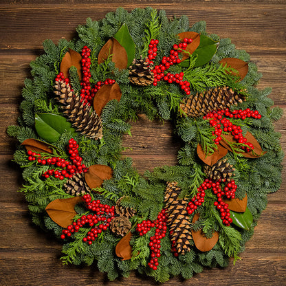 Red Berries and Magnolia on evergreen wreath