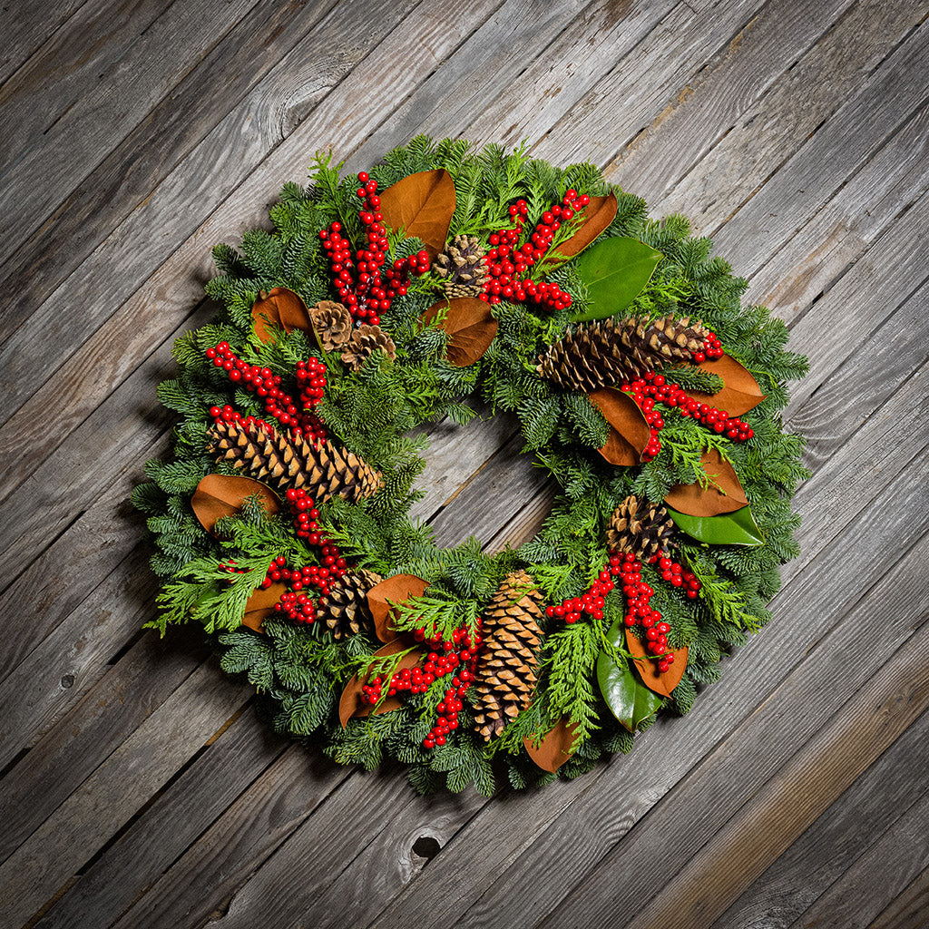 Red Berries and Magnolia on evergreen wreath