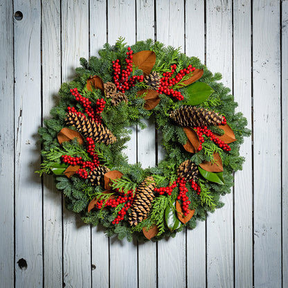 Red Berries and Magnolia on evergreen wreath