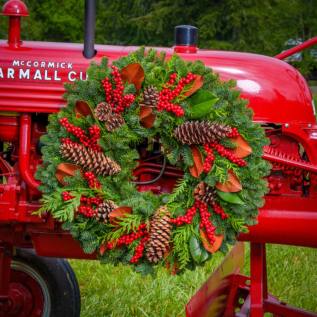 Red Berries and Magnolia on evergreen wreath