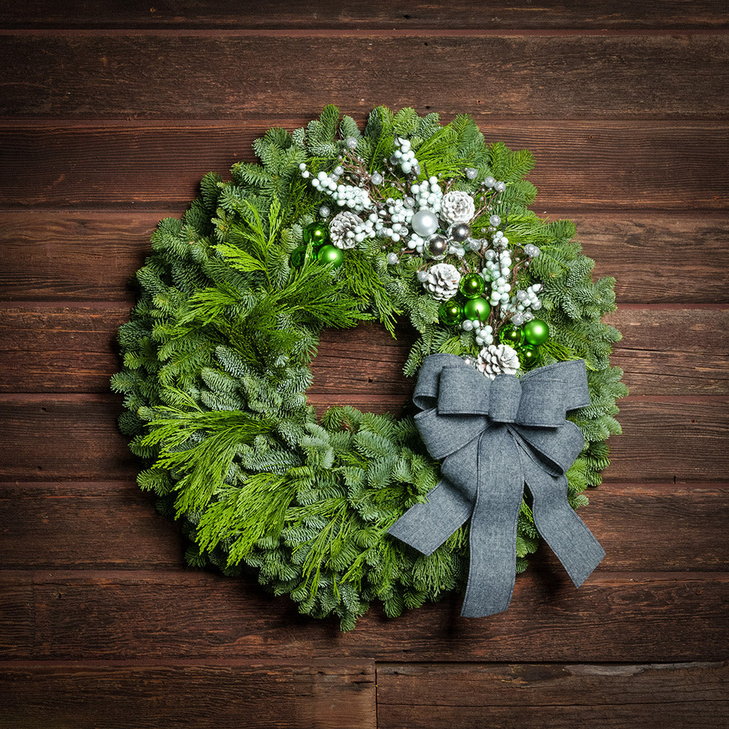 Green themed evergreen wreath