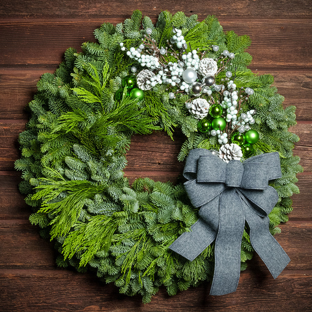 Green themed evergreen wreath