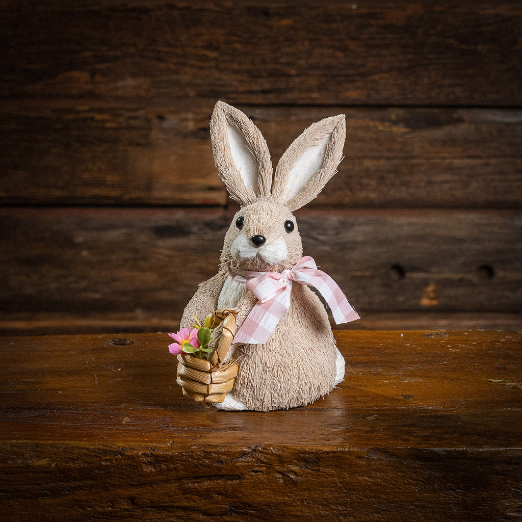 a natural sisal rabbit in a white metal pot