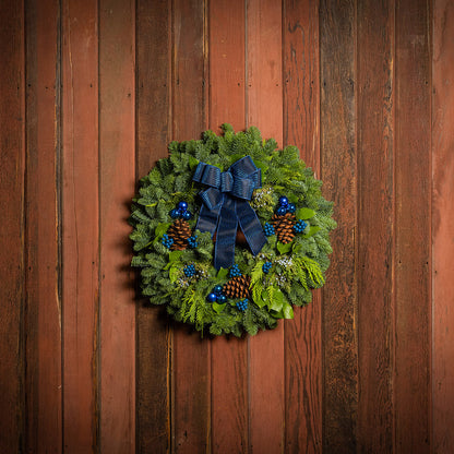 Blue Bow with Blue Balls and Berries on evergreen wreath