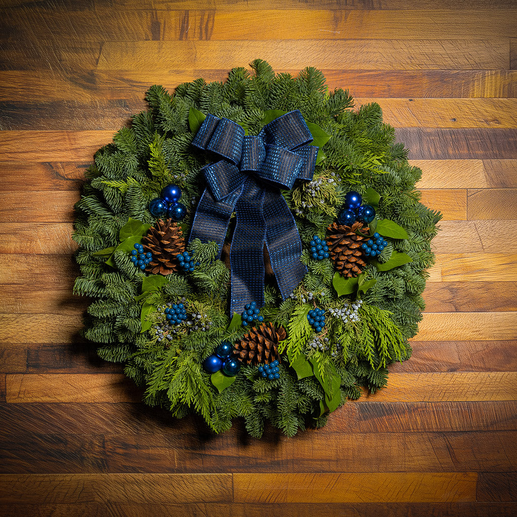 Blue Bow with Blue Balls and Berries on evergreen wreath