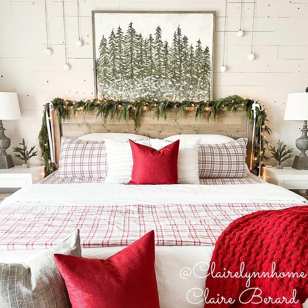 Western red cedar garland draped across a headboard..