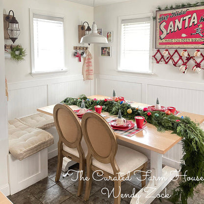 Western red cedar garland laying across the dining room table.