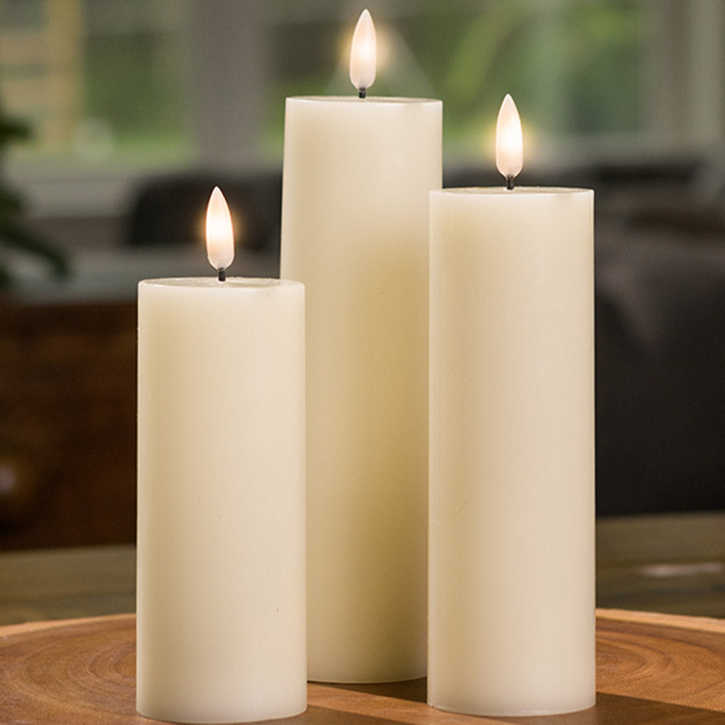 Set of 3 ivory LED candles with a 360 degree flame