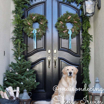 Fresh Premium garland combination of noble fir, incense and western red cedar and white pine is ultra fragrant hanging over a doorway.