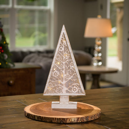 Tree shaped home decor with battery operated lights on wooden tabletop